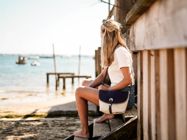 Sustainable bag from 727 Sailbags, made from 100% recycled sail, with a nautical design.