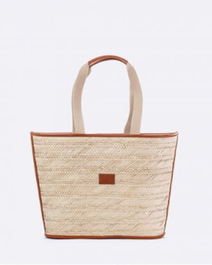 727 Sailbags Penelope Cam beach tote made from woven palm leaf with cotton handles, leather details and a practical drawstring closure.